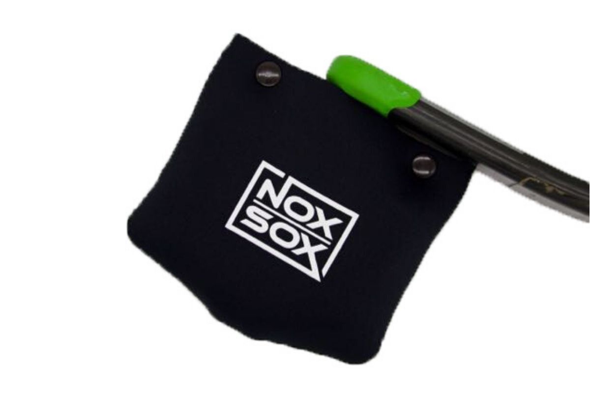 Nox Sox Large Pedal Cover sliding over a DMR Vault flat pedal